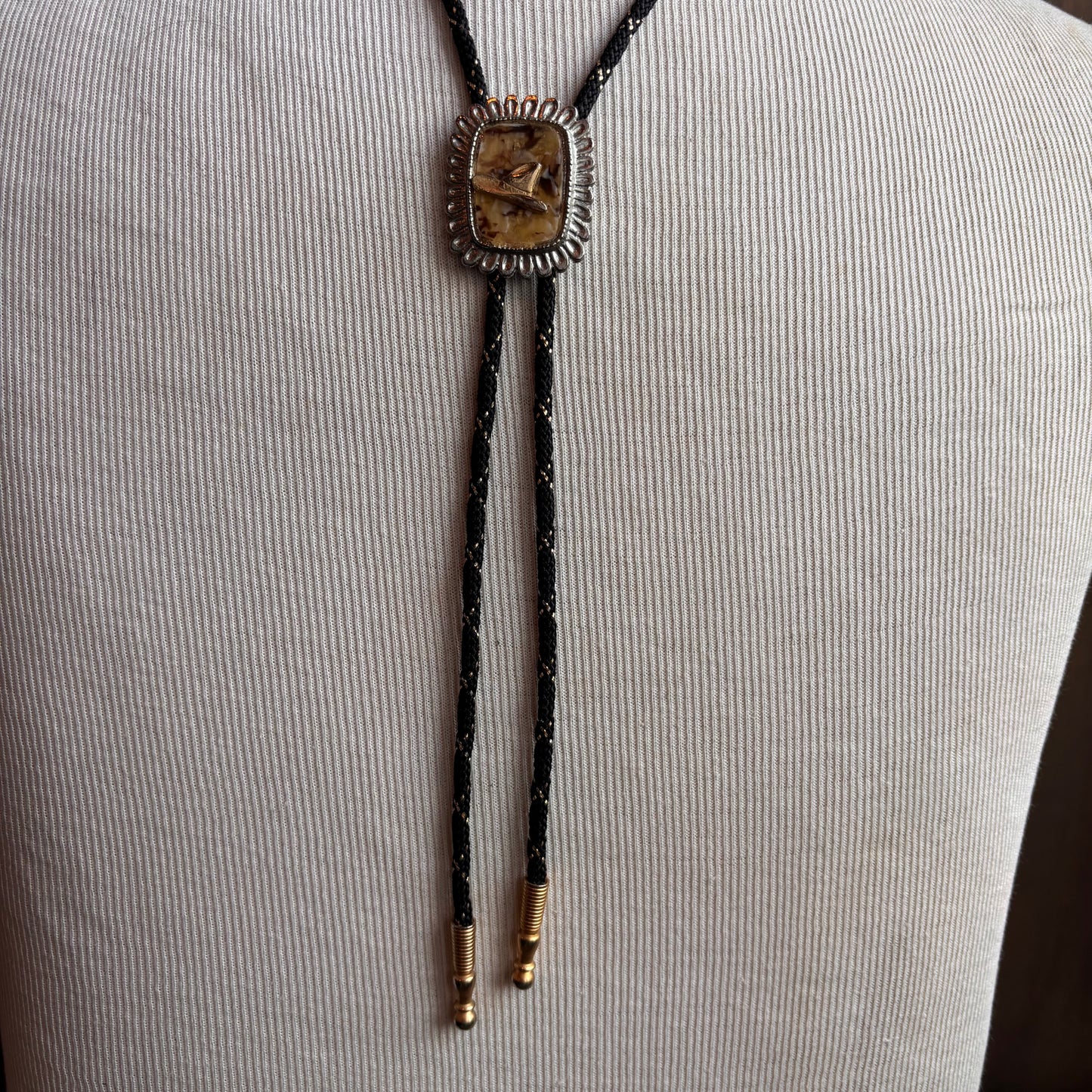 Enamel Cowboy Hat Bolo on Black Tie