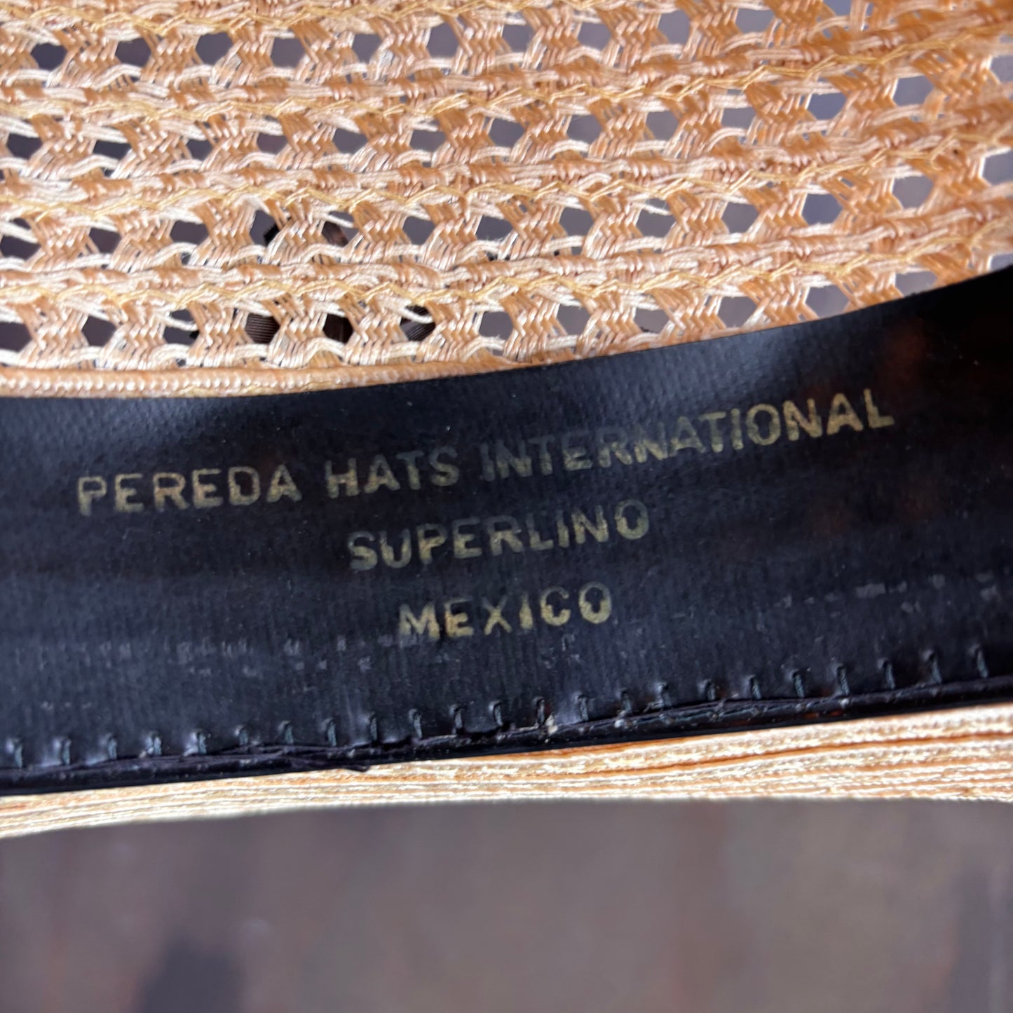 Straw Hat with Green Woven Band and Feathers