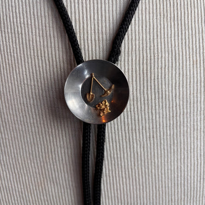 Vintage Gold Mining Bolo on Black Tie