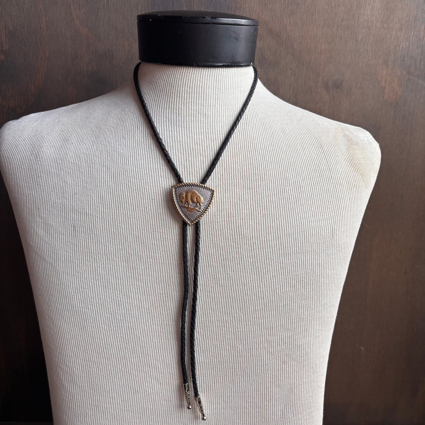 Vintage Brass Buffalo Bolo on Black Leather Tie