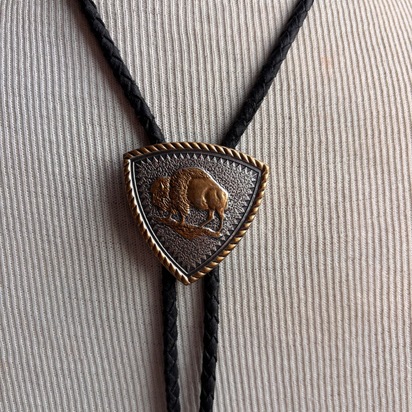 Vintage Brass Buffalo Bolo on Black Leather Tie