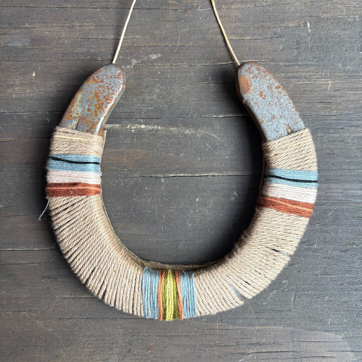 Beige Thread Wrapped Horseshoes
