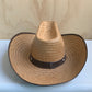 Brown trimmed straw Western hat