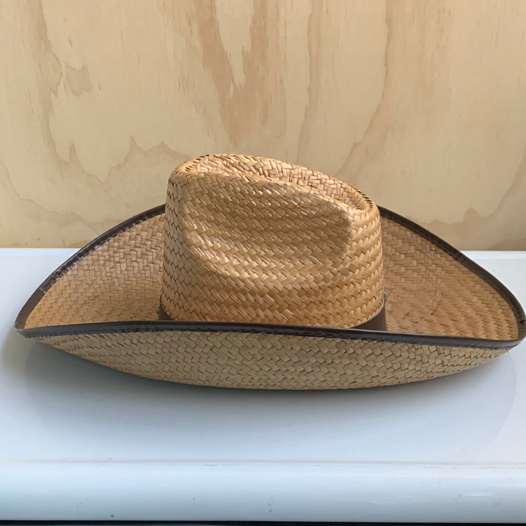 Brown trimmed straw Western hat