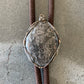Grey silver wrapped stone bolo with brown cord
