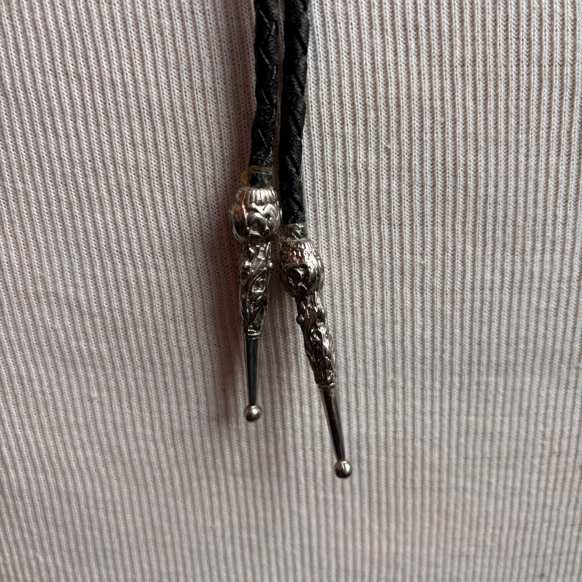Silver Longhorn Bolo with on Black Leather Tie