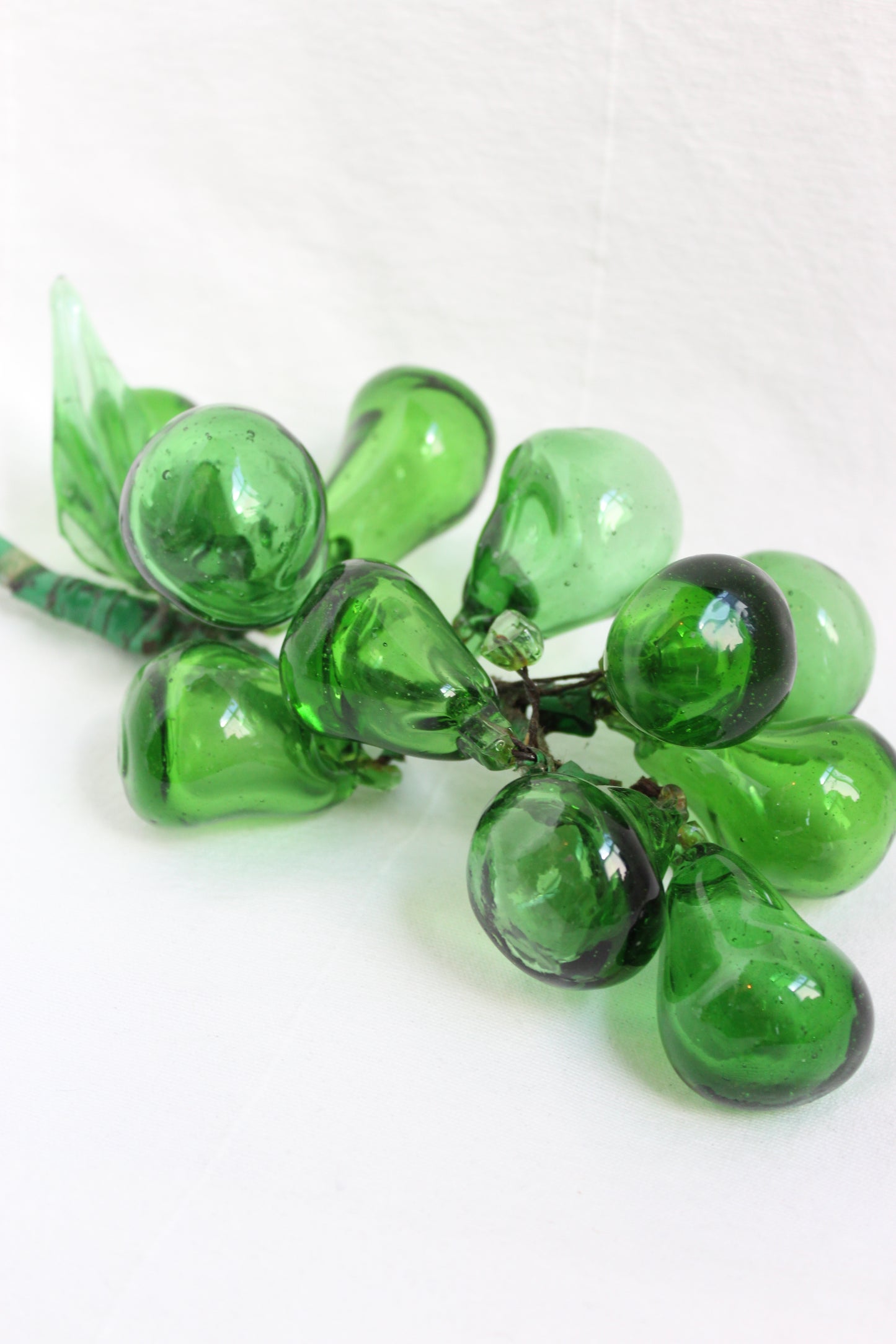 Green glass decorative grapes