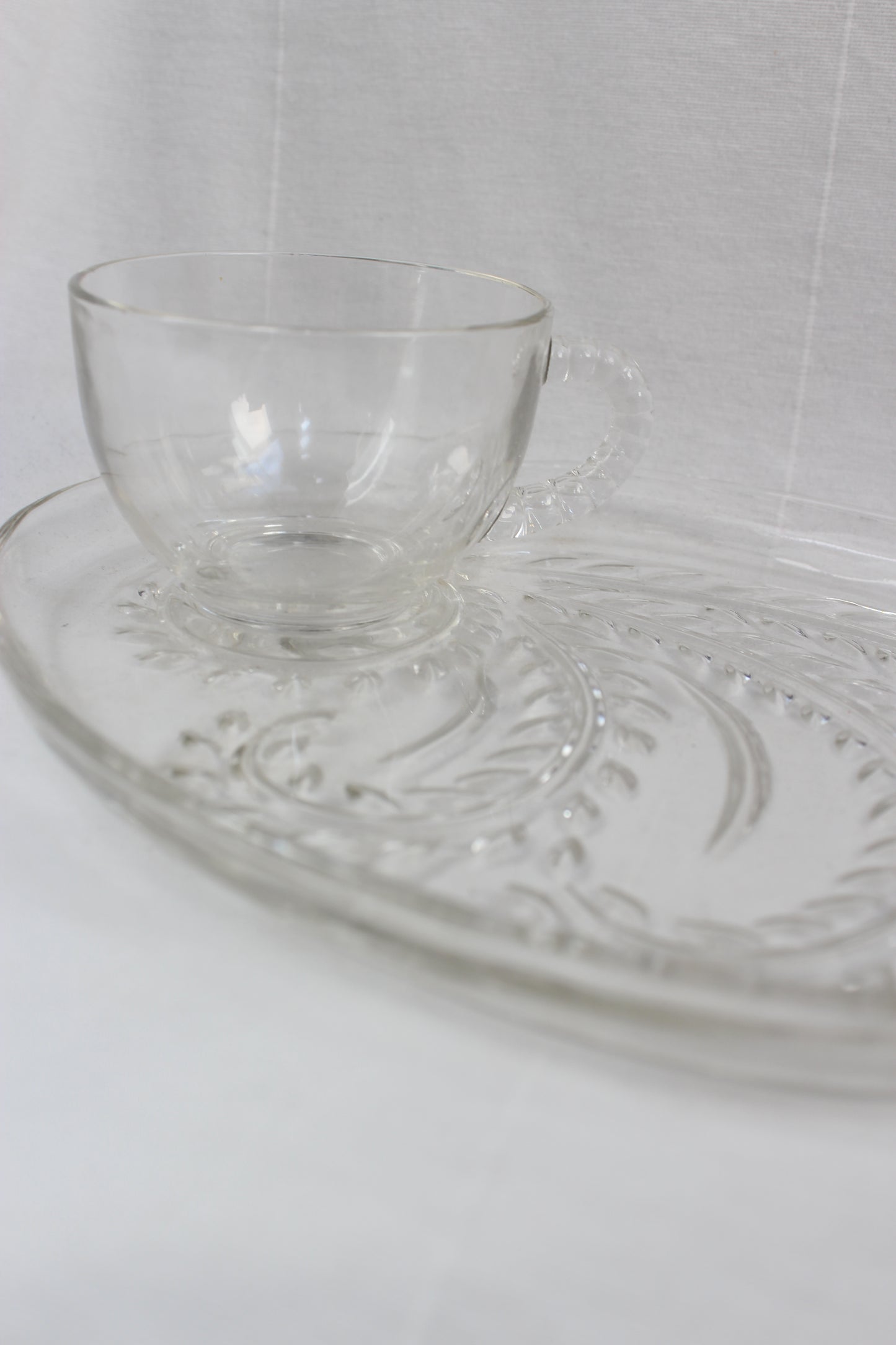 Glass tea cup and tray