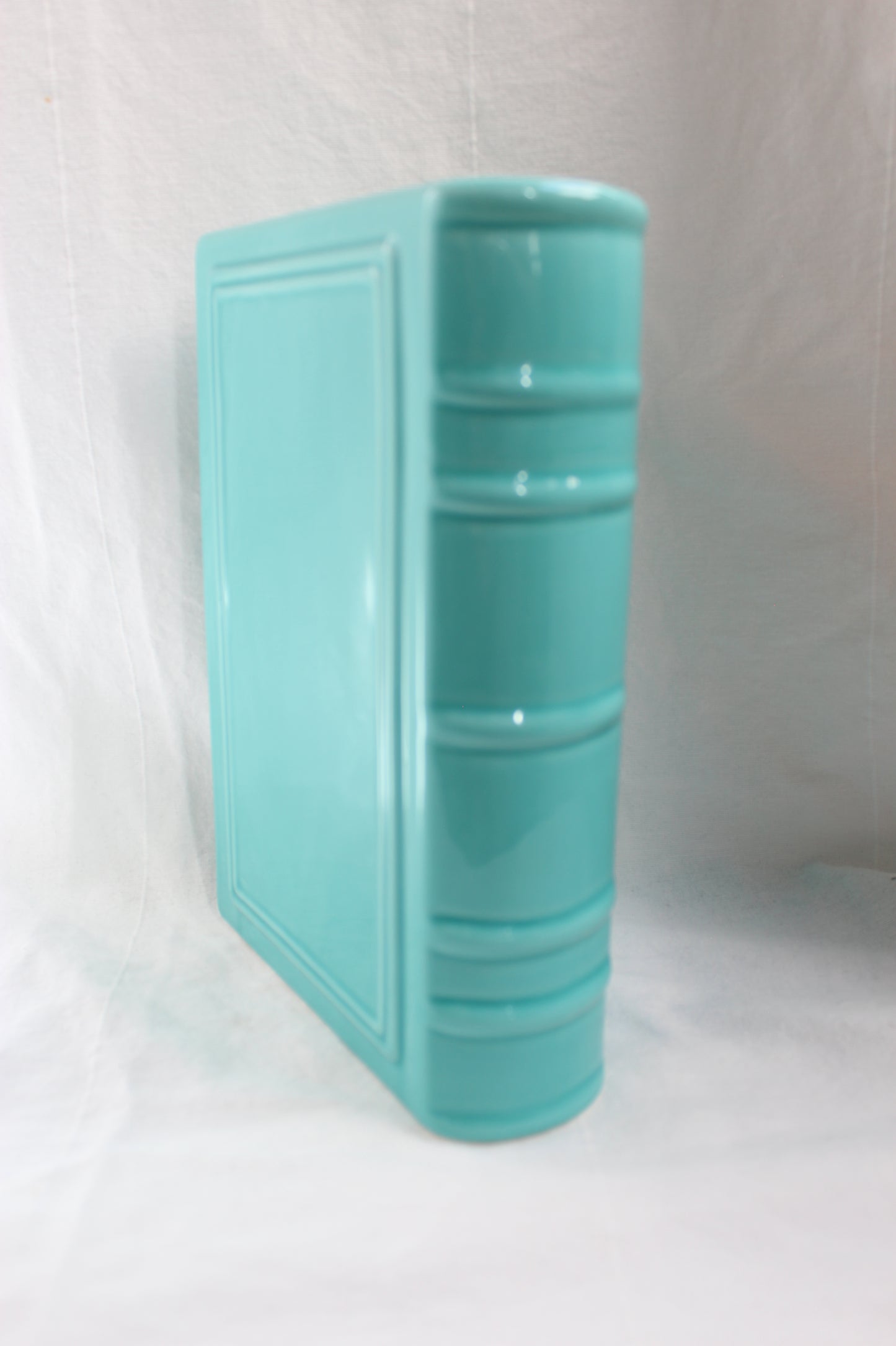 Blue ceramic book