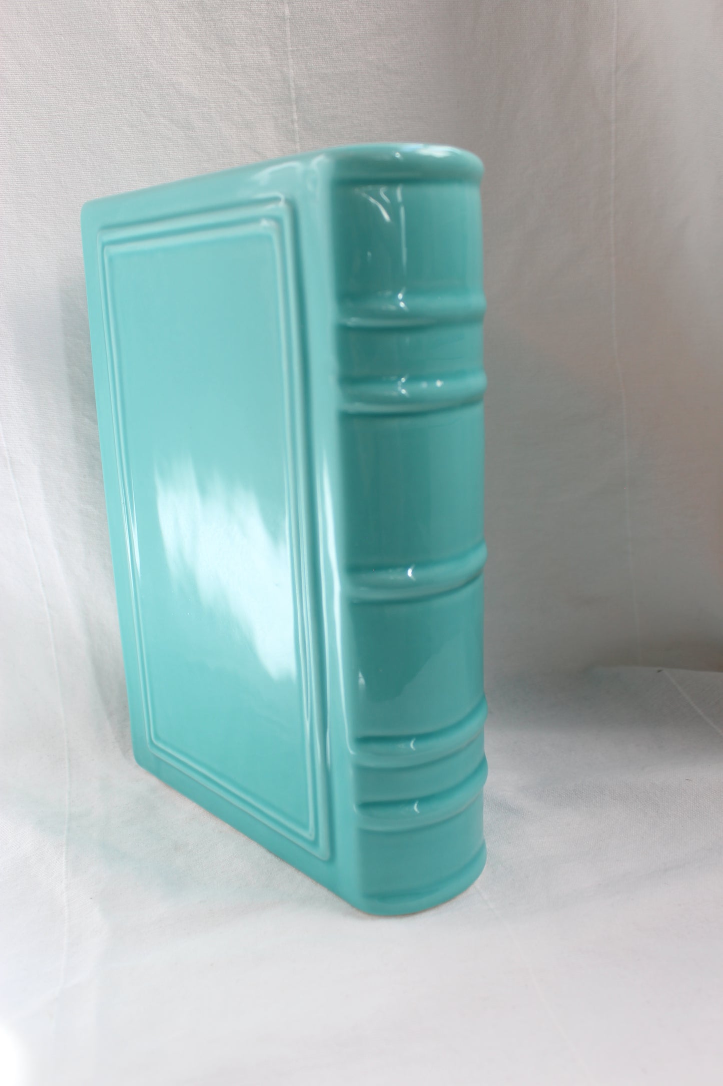 Blue ceramic book
