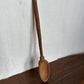 Dark wooden spoon