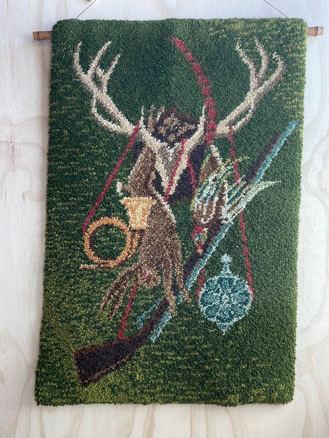 Green Woven Wall Hanging with Rabbit