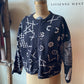 Kitty Hawk Multi-Patterned Sweater