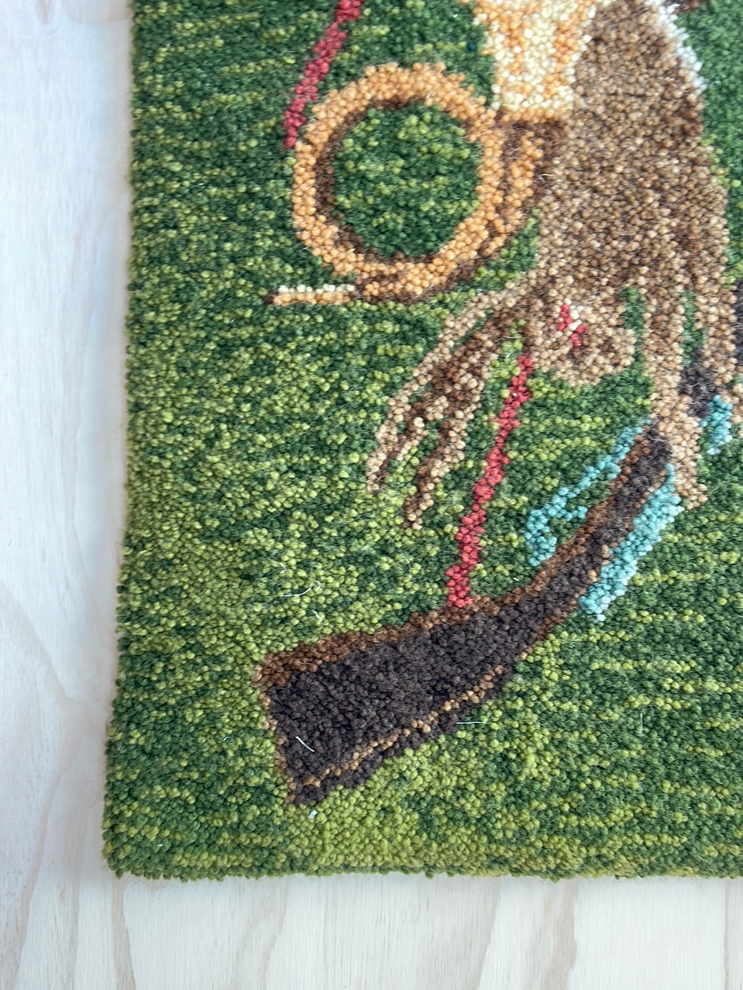 Green Woven Wall Hanging with Rabbit